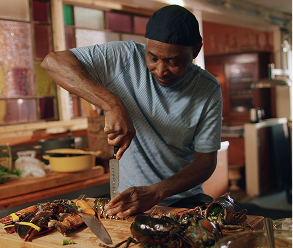 Chef preparing a meal in the kitchen